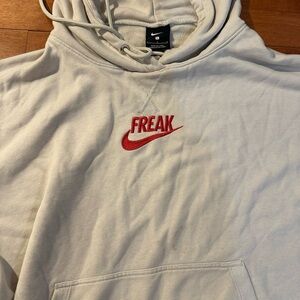 Nike Men's Giannis Freak Swish Beige Hoodie with Red Logo